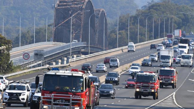 A convoy of CFA fire fighting trucks from Victoria on the M1 heading to Sydney. Picture: AAP