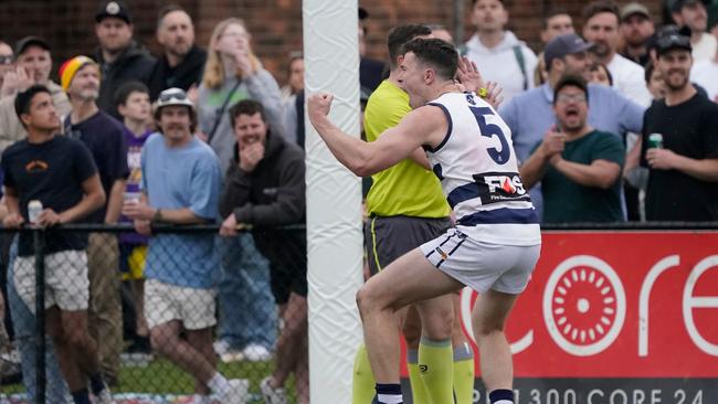 Jack Francis celebrates after putting Chelsea four points up in the last quarter. Picture: Valeriu Campan