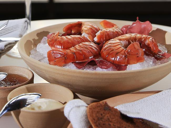 Chef Rob Cockerill pictured at Bennelong restaurant, Sydney Opera House with the Red claw yabbies dish with lemon jam, cultured cream and buckwheat pikelets. Picture: Toby Zerna