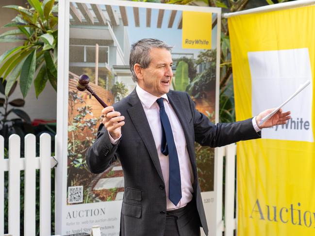 Auctioneer James Keenan at a hot auction in Newtown this morning.Picture: Tom Parrish