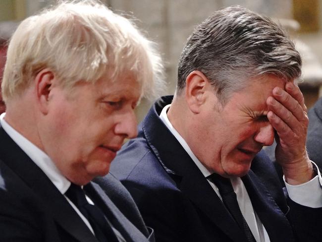 Boris Johnson and Labour Party leader Keir Starmer attend a service of prayer and remembrance in honour of slain British politician David Amess. Picture: AFP