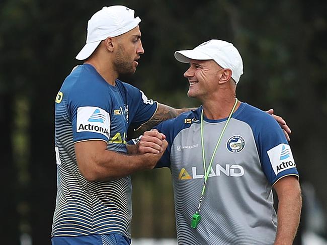 Blake Ferguson gets a hug from coach Brad Arthur. Picture: Brett Costello