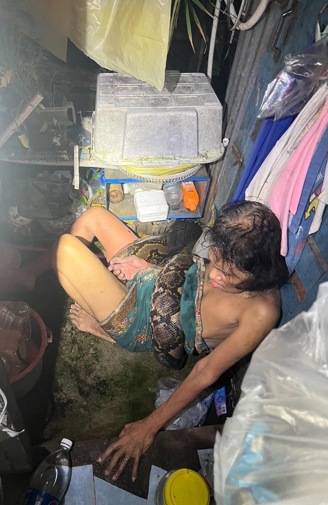 The four metre-long python wrapped itself around the 64-year-old woman’s torso. Picture: Viral Press