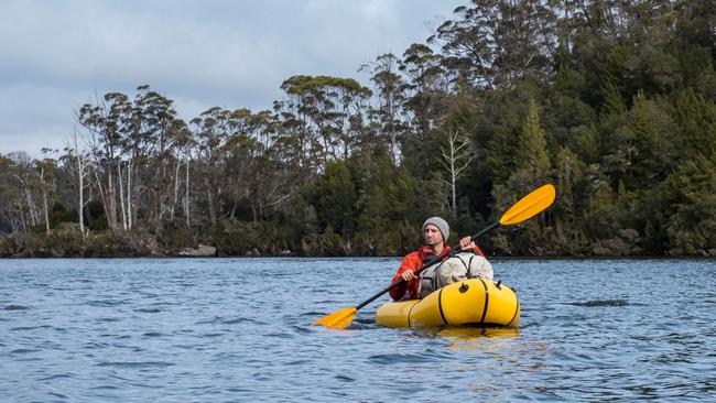 Walker and trout fisher Richard Webb leaves Halls Island on Lake Malbena where an exclusive helicopter-accessed standing camp has been proposed.