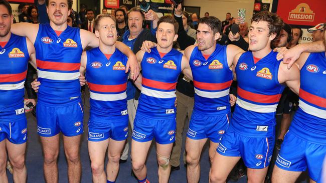 The jubilant Bulldogs sing the song. Picture: Mark Stewart