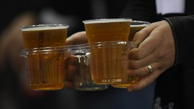 Crows cheer club president Peter Kauschke supports bringing back cans. Picture: AAP Image/Julian Smith