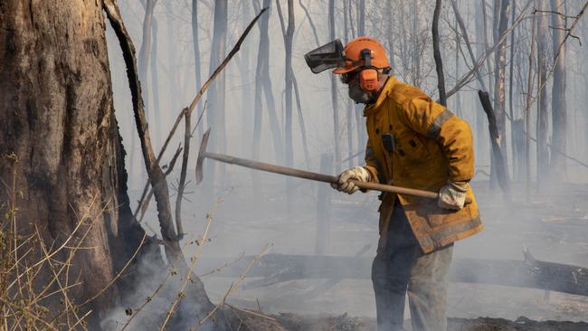 Clearer laws for landowners trying to protect their properties from bushfires could be in place by the end of the year. Queensland Fire and Emergency Services capture scenes from the Pechey bushfire.