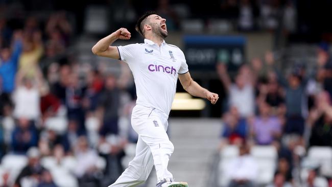 Mark Wood of England celebrates dismissing Australia captain Pat Cummins. Picture: Getty