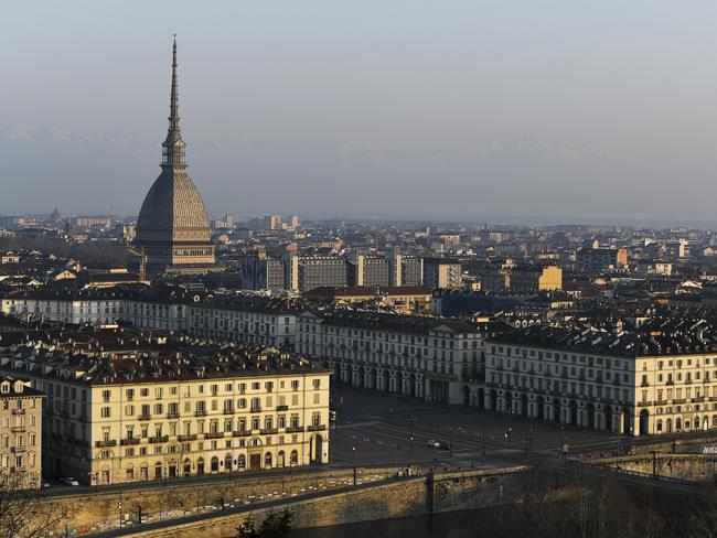 Buildings and streets in Turin, Italy, are seen during the lockdown due to the coronavirus. Italian PM Giuseppe Conte has told the nation he is tightening the lockdown to fight the rampaging spread of the coronavirus, shutting down all production facilities except those that are ‘necessary, crucial, indispensable to guarantee essential goods’. Picture: AP