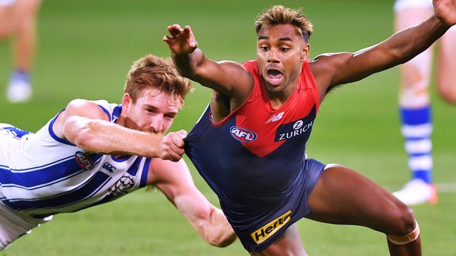 Adelaide, AUSTRALIA – AUGUST 09: Kysaiah Pickett of the Demons tackled by Sam Durdin of the Kangaroos during the round 11 AFL match between the Melbourne Demons and the North Melbourne Kangaroos at Adelaide Oval on August 09, 2020 in Adelaide, Australia. (Photo by Mark Brake/Getty Images)