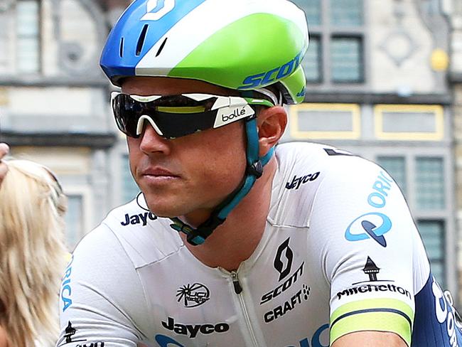 Tour de France - Stage 3 - Anvers (Antwerp) - Huy. Australian GreenEDGE rider Simon Gerrans rides back to team bus after signing on in the Town Centre. Gerrans didn't finish the stage after being involved in a mass crash. Photo Sarah Reed.