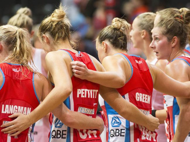 Swifts in a huddle after winning the game. NSW SWIFTS V Adelaide THUNDERBIRDS, Swifts win 68-44, Sydney Olympic Park Sports Centre. 17th April 2016. Photo by DAMIAN SHAW