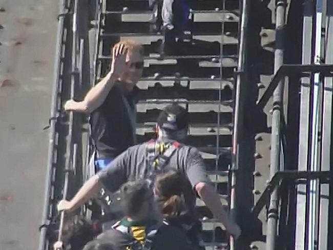 The Duke of Sussex climbs the Sydney Harbour Bridge with Australian Prime Minister Scott Morrison. Picture: Seven News