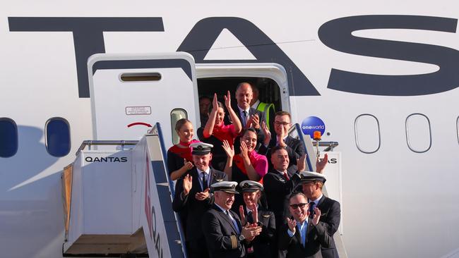 Qantas Group CEO Alan Joyce (Bottom-R) and crew exiting a Qantas Boeing 787 Dreamliner plane after arriving at Sydney international airport after completing a non-stop test flight from New York to Sydney. Picture: AFP