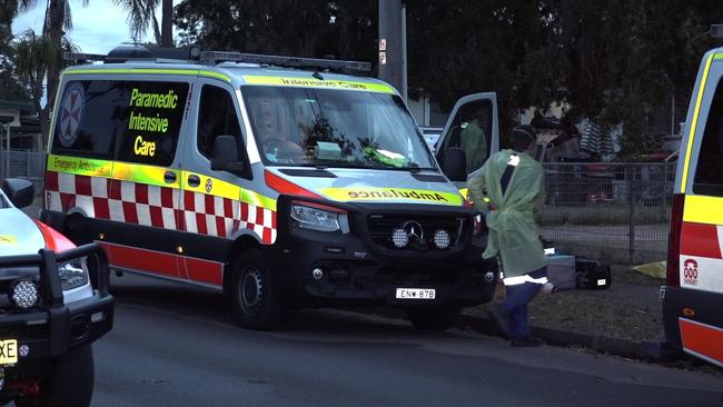 A team of police and paramedics wearing personal protective equipment discovered the body at the home on Helena Ave in Emerton. Picture: TNV