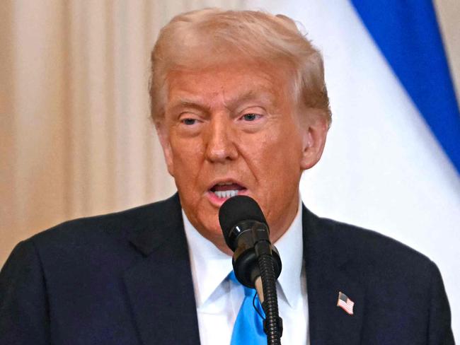 US President Donald Trump during a press conference with unseen Israel's Prime Minister Benjamin Netanyahu in the East Room of the White House in Washington, DC, on February 4, 2025. (Photo by Jim WATSON / AFP)