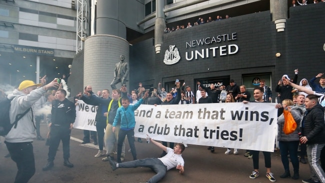 Newcastle United fans celebrate the sale of the club to the Consortium of Amanda Stavely, Jamie Rueben and PIF. Picture: Michael Driver/MI News/NurPhoto via Getty Images