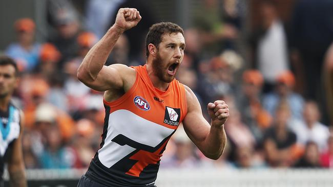 Giant Shane Mumford celebrates a goal against Port Adelaide. Picture: Phil Hillyard