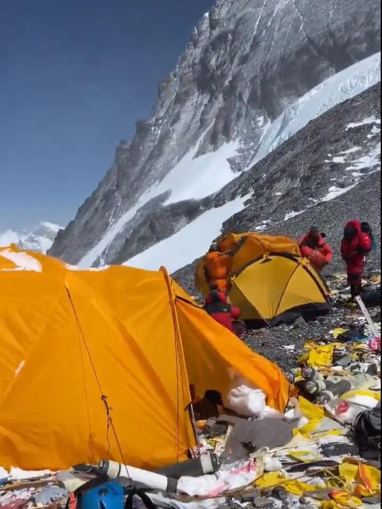 Tenzi Sherpa, who shared the video on Instagram, described it as the “dirtiest camp” he had ever seen, showing abandoned tents, oxygen bottles, steel bowls, spoons, sanitation pads, and paper littering the area. Picture: Tenzi Sherpa/Jam Press