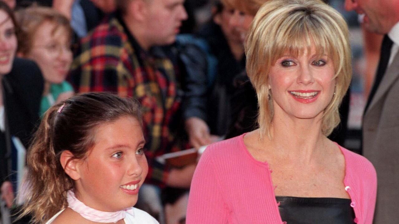 The singer and her daughter Chloe Lattanzi attend the premiere of the 20th anniversary re-issue of Grease at the Empire Theatre, Leicester Square, London, in 1998.