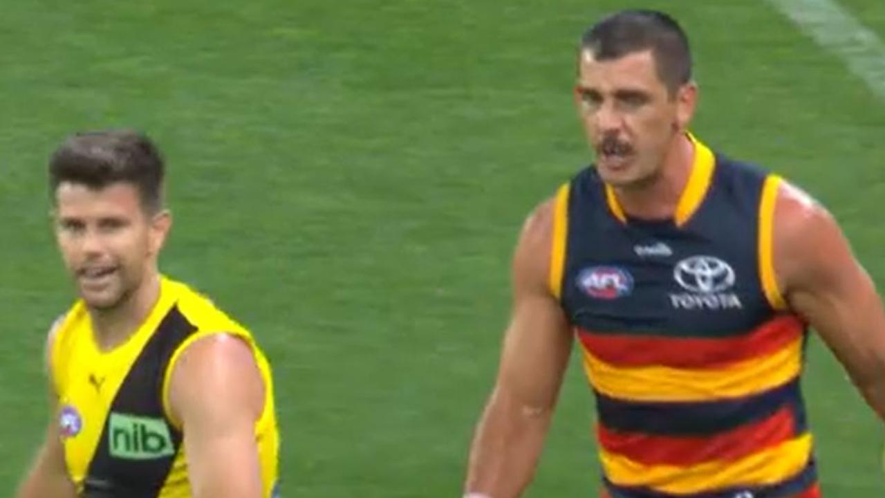 Tensions flared between Cotchin and Walker.