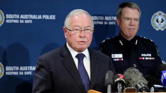 Former Independent Commissioner Against Corruption Bruce Lander and former police commissioner Gary Burns during a press conference about six SA police officers charged with theft or corruption. Those charges were later dropped or the officers were acquitted.