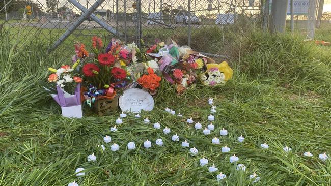 Floral tributes left at the scene of a fatal car crash at Edinburgh RAAF base. Pics: Todd Lewis