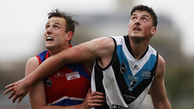 Huonville's Rhys Ward and Cygnet's Jordan Lane compete in the ruck. Picture: Zak Simmonds