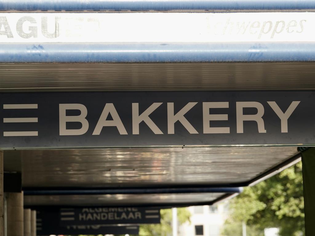 Signs in Afrikaans adorn Pirie St, Adelaide. Picture: AAP/Mike Burton