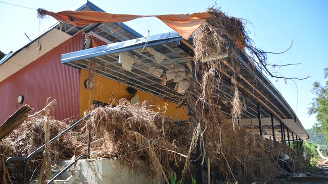 The remains of the Bana Yirriji Art and Cultural Centre and cafe at Wujal Wujal after the flood that peaked on December 17. Picture: Bronwyn Farr