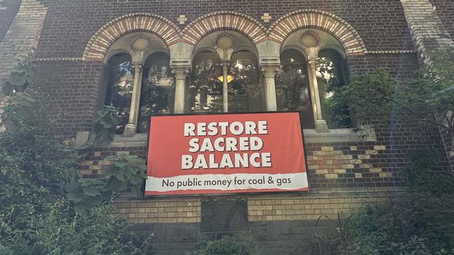 A sign on a church in Melbourne’s Collins Street. I wonder if these people realise that their “sacred balance” is someone else’s prison. Let me explain.