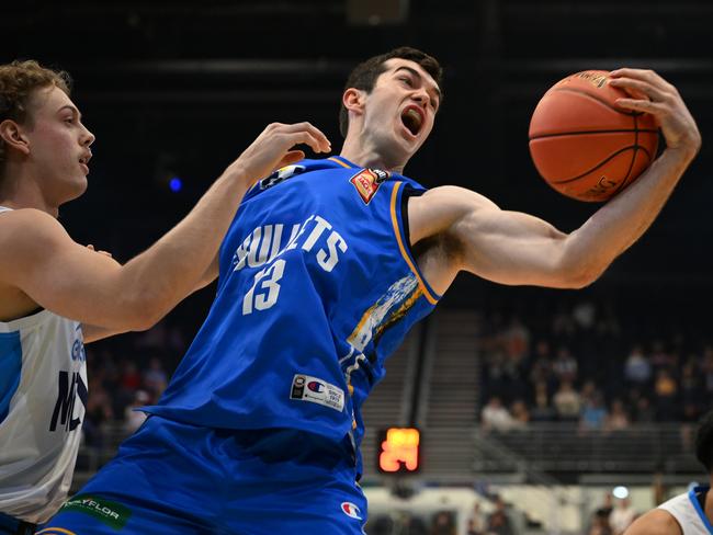 GOLD COAST, AUSTRALIA - SEPTEMBER 16: Josh Bannan of the Bullets and Luke Travers of Melbourne United compete for the ball during the 2023 NBL Blitz match between Brisbane Bullets and Melbourne United at Gold Coast Convention and Exhibition Centre on September 16, 2023 in Gold Coast, Australia. (Photo by Matt Roberts/Getty Images for NBL)