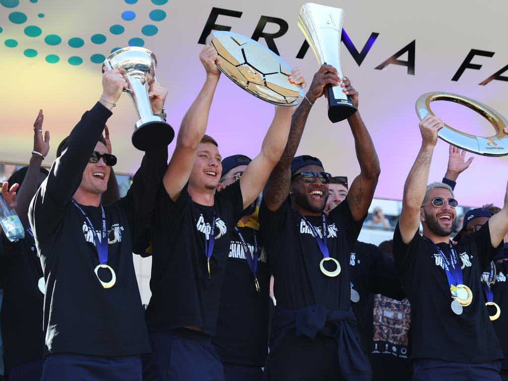 Mariners players lift the team’s silverware in May. Picture: Scott Gardiner/Getty Images