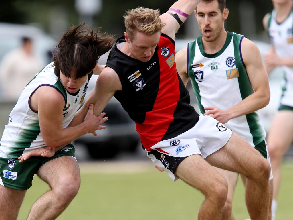 Bell Park’s Fraser Marris and Newtown &amp; Chilwell Mitch Diamond compete for the ball. Picture: Mark Wilson