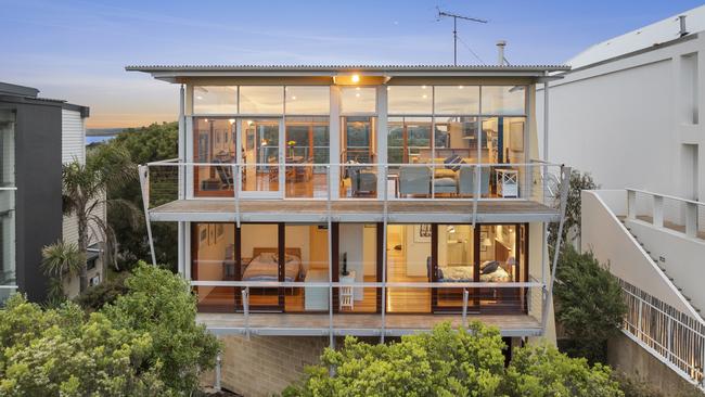 Floor to ceiling glass fronts two floors of the home at 5/43 Flinders St, Queenscliff.