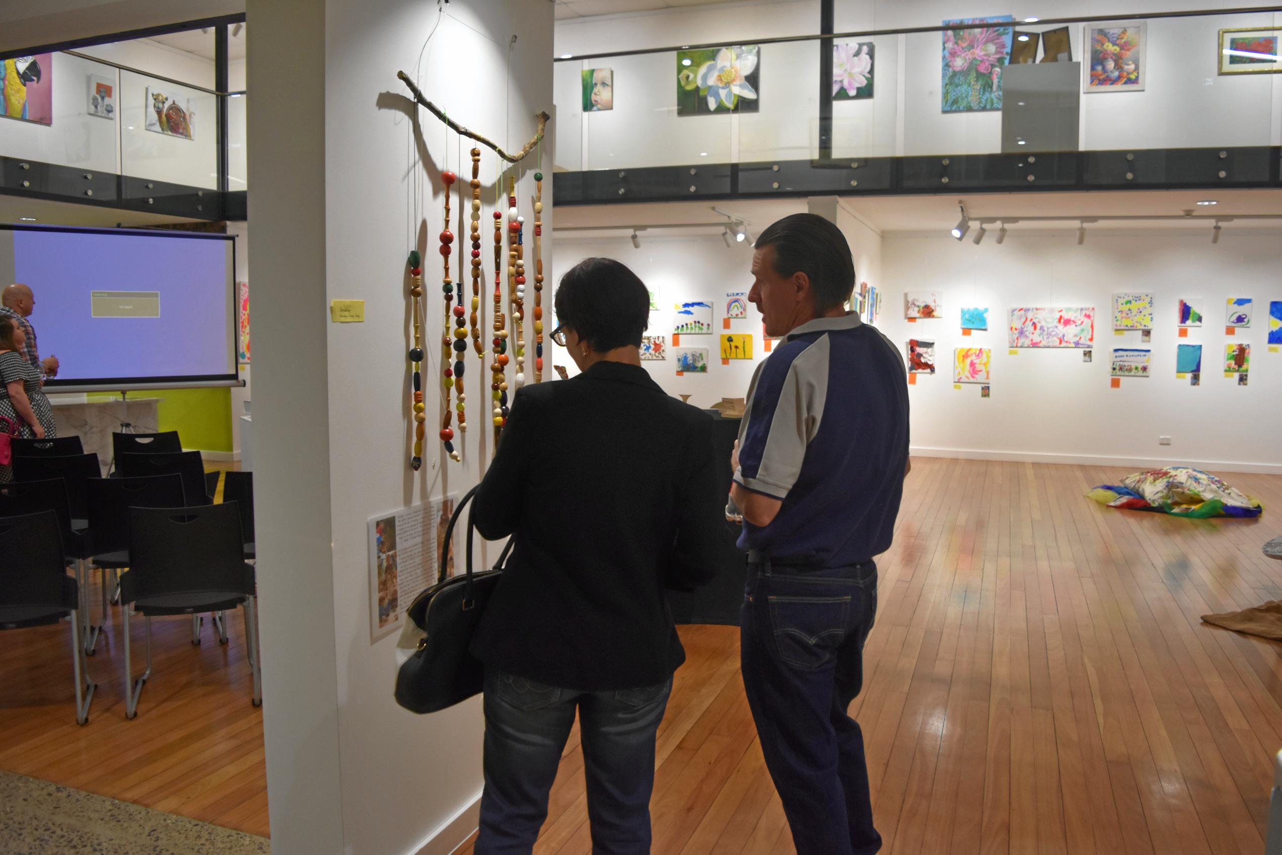 Guests looking around the 2019 KAOS exhibition. Picture: Shannon Hardy