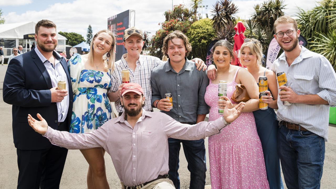 At 2023 Audi Centre Toowoomba Weetwood race day (from left) Nick White, Lucy Wright, Lachlan Rodd, Tim Rayner, Jess Betros, Elle Rayner, Caleb Joyce and Ben Betros (front) at Clifford Park Racecourse. Picture: Kevin Farmer