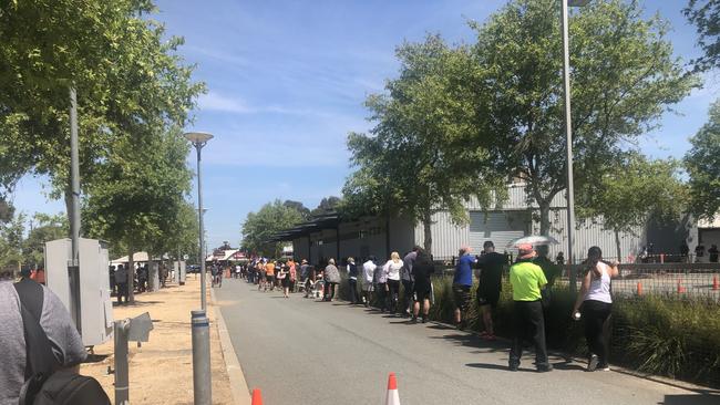 Residents in Shepparton, Victoria, form long queues for Covid testing. Picture: Remy Varga