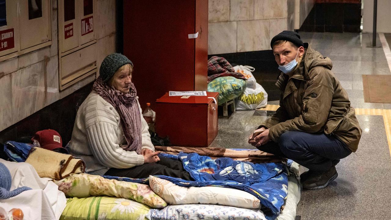 Residents take refuge in a metro station, being used as bomb shelter, in Kyiv on March 18, 2022. Picture: Fadel Senna / AFP