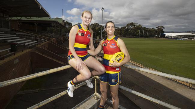 Adelaide player Brooke Tonon with her captain Chelsea Randall at the Crows’ proposed new headquarters at Thebarton Oval. Picture: Simon Cross