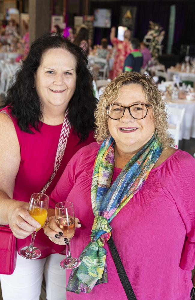 Karen Hobbs (left) and Karyn White at the Pink High Tea fundraiser for Toowoomba Hospital Foundation at The Goods Shed, Saturday, October 12, 2024. Picture: Kevin Farmer