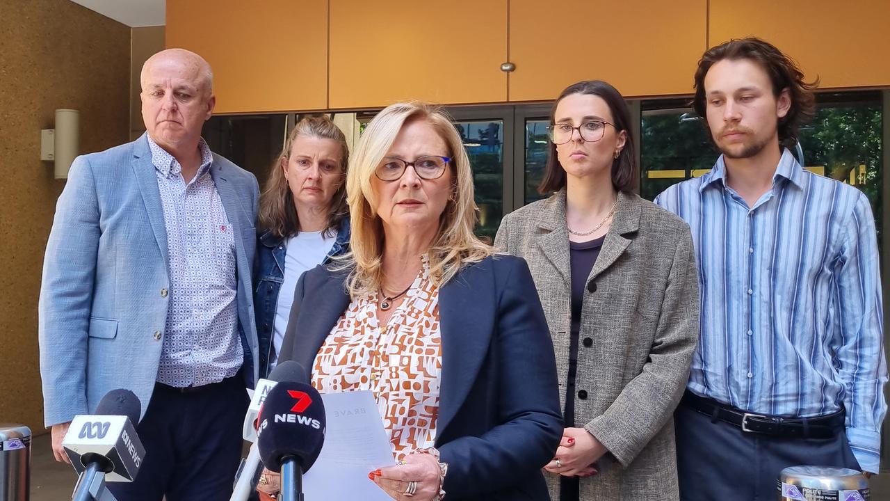 Kirsten McMahon, mother of schoolboy Lachlan Cook, speaks to the media outside the Coroners Court of Victoria, with her family. Picture: Newswire / Liam Beatty