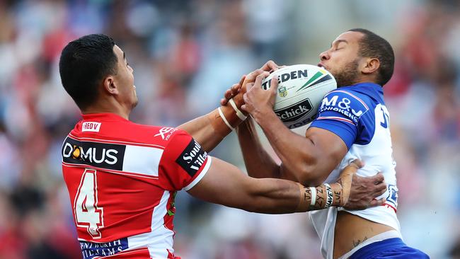 Moses Mbye in action against the Dragons in round 14, a match shaping up to be one of his last in blue and white. Picture: Brett Costello