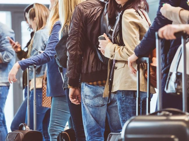 Travellers waiting to board a flight.