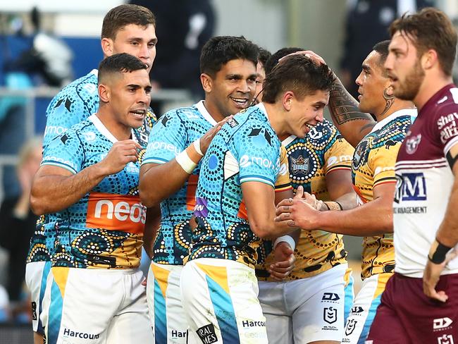 GOLD COAST, AUSTRALIA - JUNE 20: Jayden Campbell of the Titans celebrates a try during the round 15 NRL match between the Gold Coast Titans and the Manly Sea Eagles at Cbus Super Stadium, on June 20, 2021, in Gold Coast, Australia. (Photo by Chris Hyde/Getty Images)