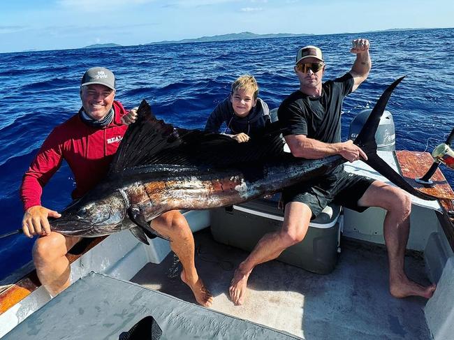 Chris Hemsworth and his son Tristan on a fishing trip in Fiji.