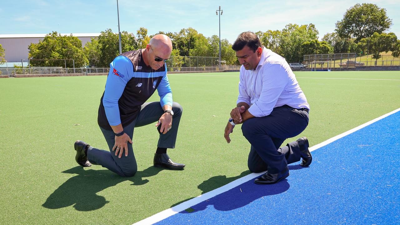 People, sport and culture Minister Jinson Charls and Hockey NT chief executive Jason Butcher at the refurbished second turf.