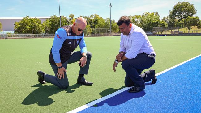 People, sport and culture Minister Jinson Charls and Hockey NT chief executive Jason Butcher at the refurbished second turf.