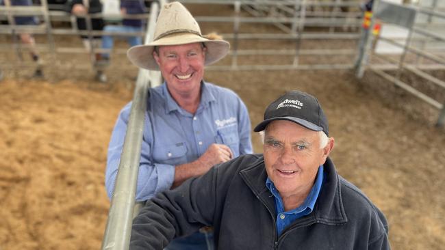 Max McBurney from Euroa, right, secured a large pen of 26 Angus heifers for $2350 or 638c/kg with his agent Mick Curtis from Rodwells Euroa.