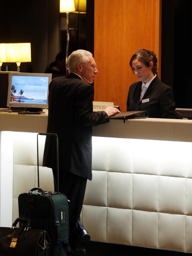 Stanley Fischer checking out of the Sheraton on the Park in Sydney after the RBA’s 50th anniversary. Picture: Sam Mooy